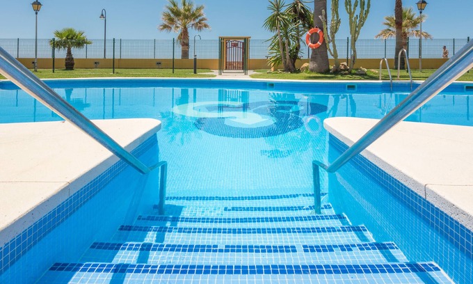 Bolonia Apartment | Ground floor beachfront, shared pool