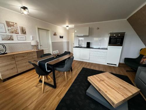 Albertsdorf Apartment | Haus-Fehmarn-am-Dorfteich-|-Wohnung-1-Sued