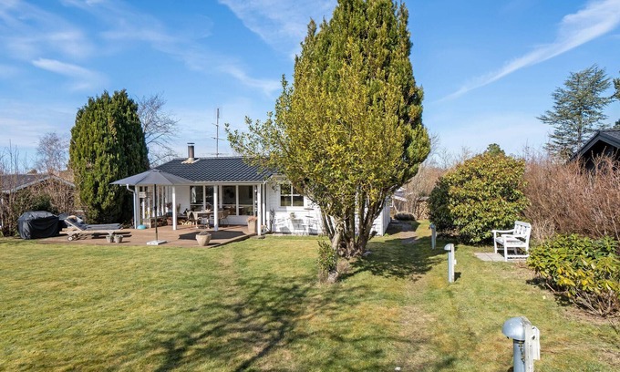 Dronningmolle House | Have a great time near the sea in this vacation home.