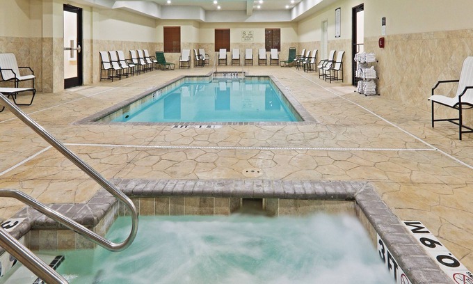 Central Oklahoma City Condo | Heated Saltwater Pool. Hot Tub. Free Breakfast Buffet Daily.