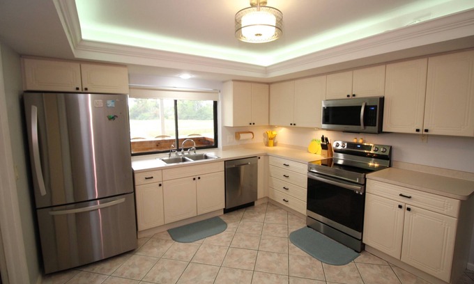 Lochmoor Waterway Estates House | Heated screened in private salt water pool.