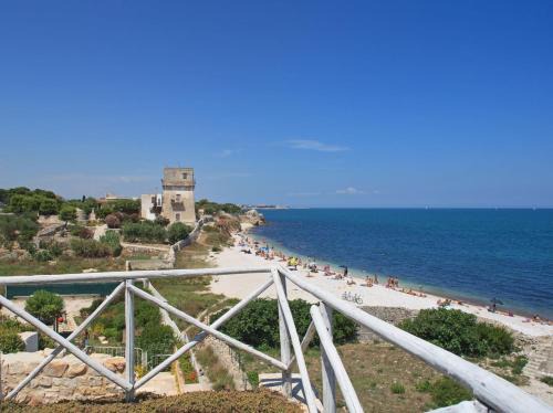 Bisceglie Villa | HelloAPULIA - Sweet Trullo on the Beach - Unique Seafront house with Direct Beach "Ponte Lama" Access and Private Patio