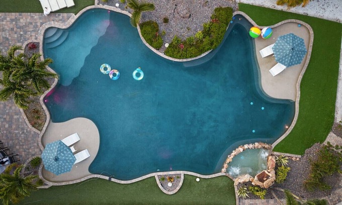 St. Petersburg - Clearwater Apartment | Hidden Lagoon 🌴 Private Resort | Pool, Pickleball, Mini Golf + More!