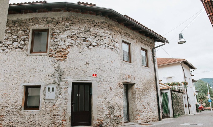 Tolmin House | Hisa Gradnikova 1850's stone cottage in the heart of Tolmin old centre