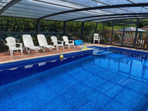 Portreath Apartment | Historic Bassets acre, 4 min walk to Beach, Pubs,Restaurants, Shops, Htd Pool, Stunning walks, Hottub, Games rm, Garden, BBQ, Just 6 beautiful 1-3 bdr Apartments, Enjoy being one of the few! Free Parking and WIFI