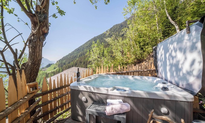 San Martino in Passiria Apartment | Holiday Apartment "Bergsuite" with Mountain View, Balcony, Garden & Wi-Fi