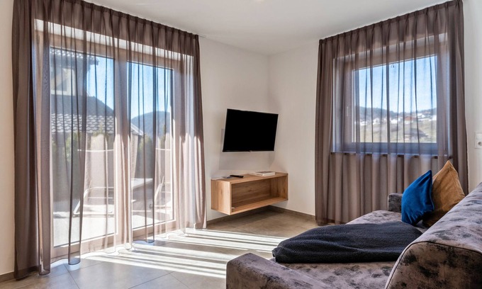 San Genesio Atesino Apartment | Holiday Apartment "Aster Moments Apt Moritz" with Terrace & Wi-Fi