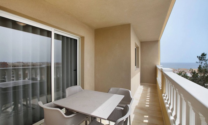 El Medano Apartment | Holiday Apartment 'La Perla E35 By Médano Rentals' with Shared Pool, Balcony and Wi-Fi