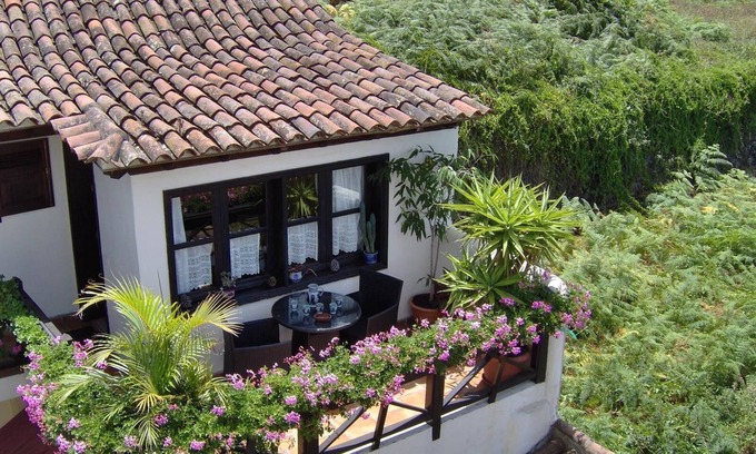 El Guincho Apartment | Holiday flat "Apartamentos Monasterio de San Antonio No. 4" with private balcony and sea view