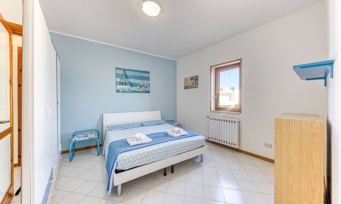 Lido Marini House | Holiday Home 'Casa A Lido Marini' with Balcony and Air Conditioning