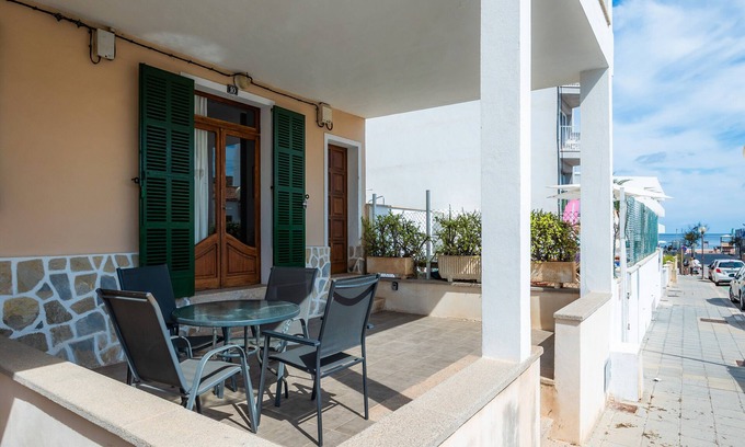 Can Picafort House | Holiday Home 'Casa Tradicional Can Picafort' with Private Garden, Balcony and Wi-Fi