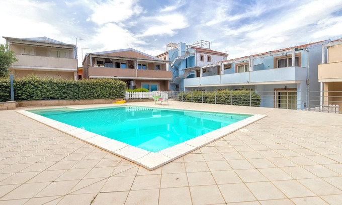 Viddalba House | Holiday Home 'Romantica Casa Al Mare' with Shared Pool, Wi-Fi and Air Conditioning