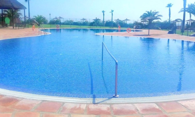 Atlanterra Apartment | Homerez - 150 m away from the beach! Appartement for 4 ppl. with shared pool
