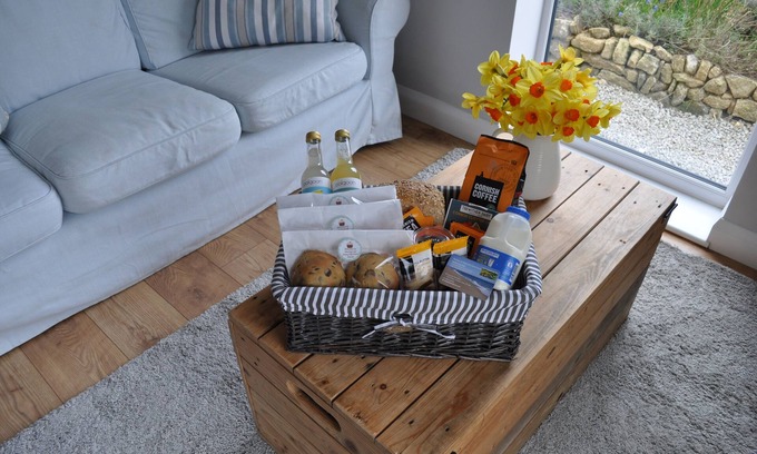 Mabe Cottage | Hot tub and covered seating area with log burner and BBQ