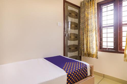 Aluva Hotel | Hotel O Aluva Railway Station Formerly Menachery Tourist Home