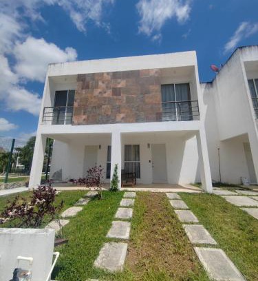 Jimenez House | House in front of the Maya Playa del Carmen train