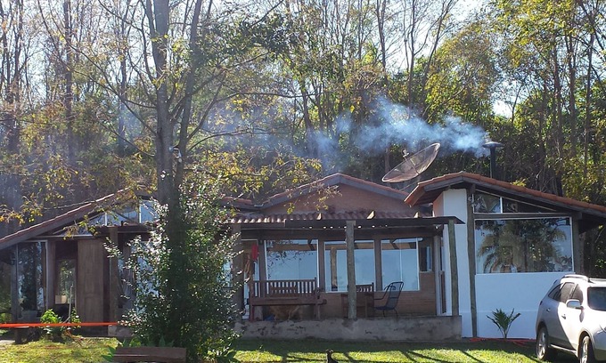 Delfinopolis Cottage | House in the woods, surrounded by the Rio Grande and stunning view of the sunset.