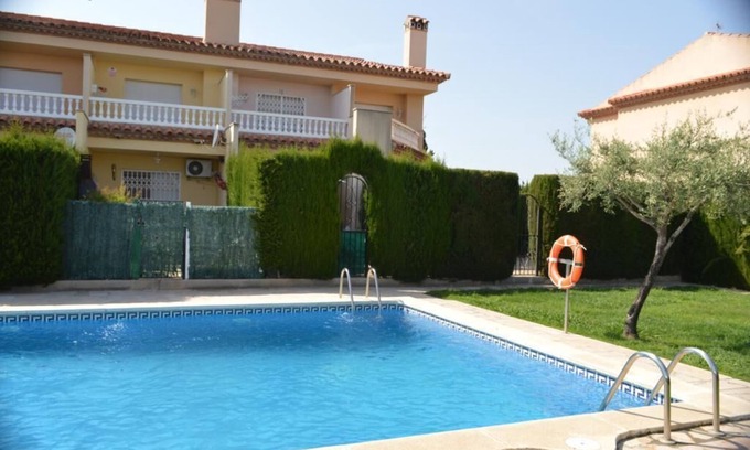 Miami Platja House | HOUSE WITH BARBECUE, INTERNET, WIFI, GARDEN, AIR CONDITIONING AND POOL Comunit