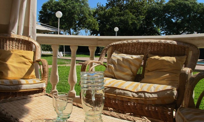 Punta Umbria Apartment | House with garden and pool a few steps from the sea