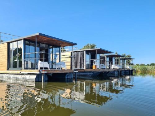 Mielno Boat Rental | Houseboat in azy by Lake Jamno and Sea