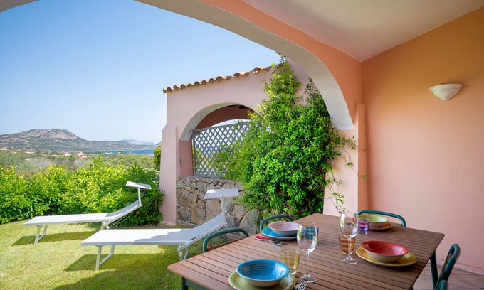 Porto San Paolo Apartment | Il Poggio 8 - flat with shared pool and garden