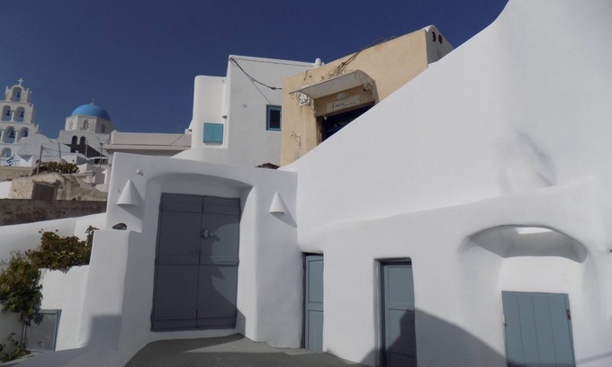 Pyrgos House | Imarkellis Pyrgos Traditional House and Belfry Charm with Courtyard in Santorini