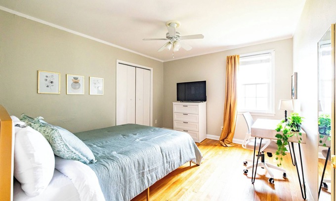 Berclair House | In-home fitness; Desk + TV in each bedroom