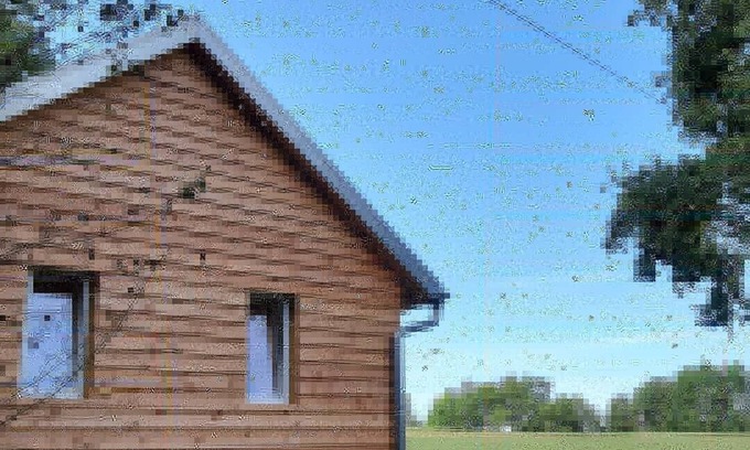 Biebergemund House | In the middle of nature, wooden house on the edge of the forest with a view of meadows and fields