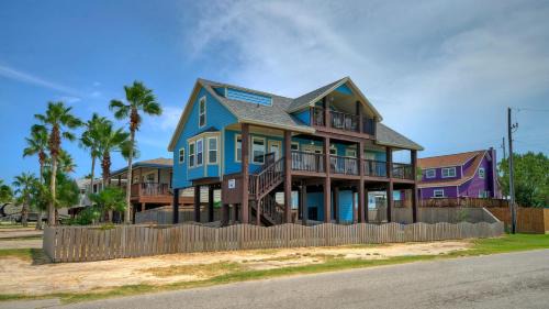 Leeward Sands House | Incredible Nature Views Golf Cart for Rent Balcony Blue Crush by AvantStay