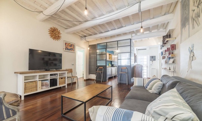 Rione III Colonna Apartment | Industrial Chic Loft Apartment in Historical Building