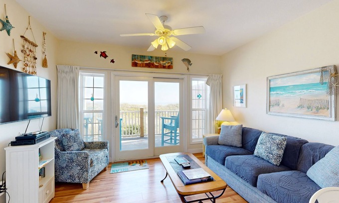 Hatteras Condo | Inviting beachfront condo featuring hot tub & pool, central AC, elevator, & deck