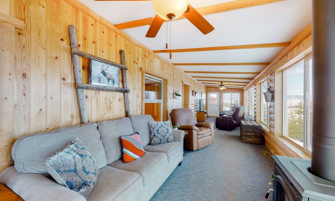 Polson House | Inviting lake view home with fireplace, golf nearby, full kitchen, & W/D