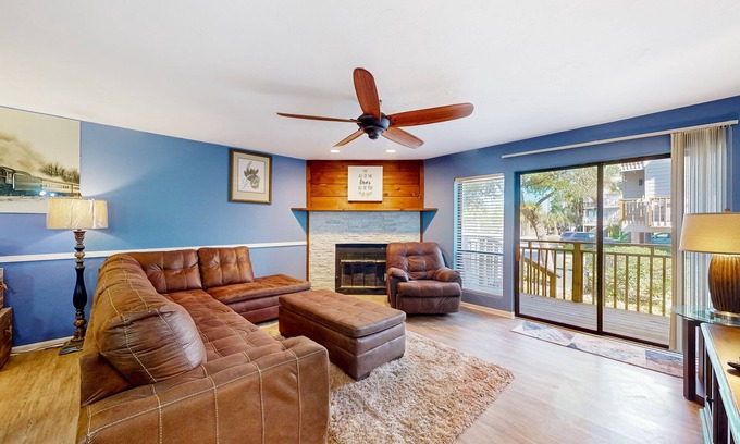 East End House | Inviting townhouse with on-site pool, updated interior, & W/D