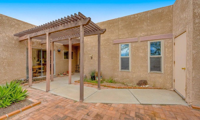 The Foothills Townhomes House | Inviting townhouse with pool, enclosed yard, patio, mountain view & W/D