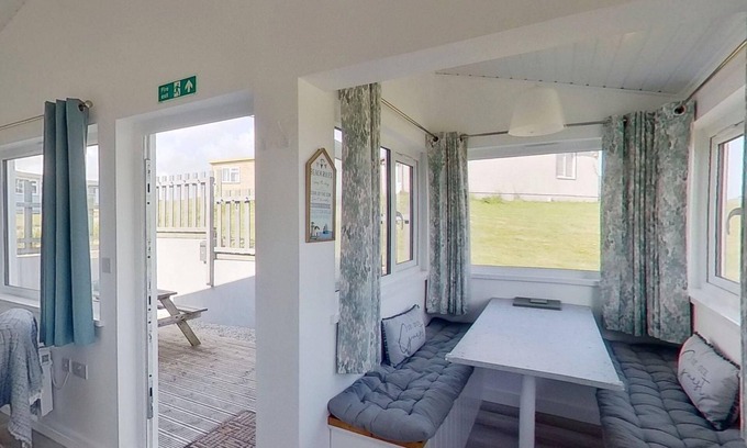 Hayle Apartment | Irene sits amongst the dunes, just a short walk to the three miles of golden, sandy beach below