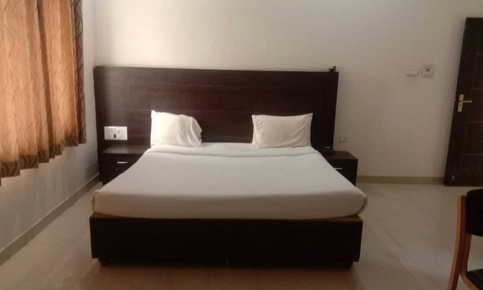 Chamarajanagara House | iROOMZ Nijaguna Residency