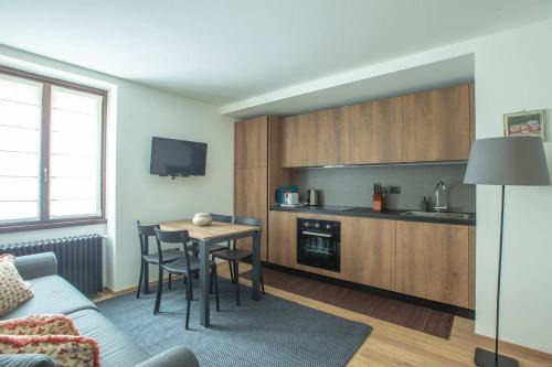 Courmayeur Apartment | JOIVY Warm Flat for 4, with Parking in Courmayeur