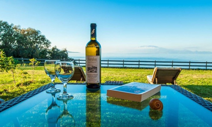Psarou Villa | Kavos Psarou stone and wooden built sea front sea view traditional/lux villa