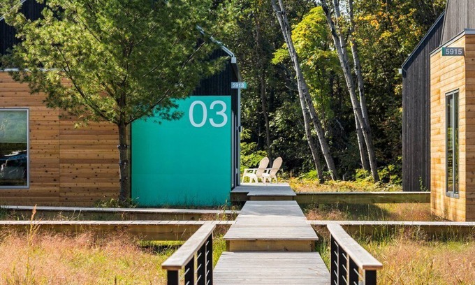 Acme House | KOTI 3 (Two Bedroom) Traverse City's Scandinavian Cabins, vacation home on TART & mins to Traverse C