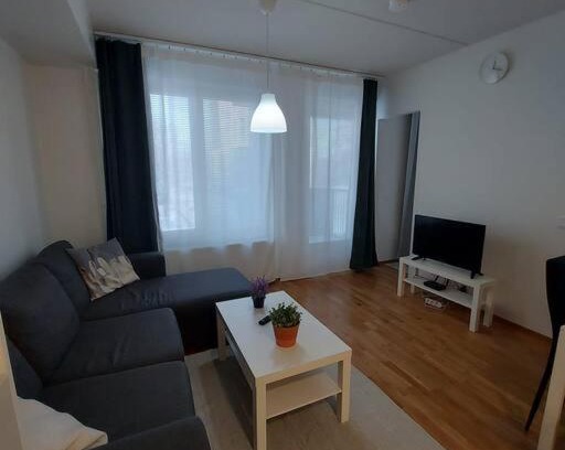 Lantinen District Apartment | Kotimaailma - Tyylikäs kaksio modernilla keittiöllä