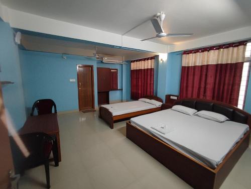 Beltola Hotel | Krishna Inn