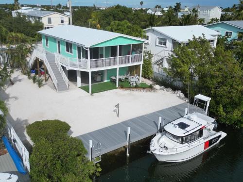 Breezeswept Beach Estates House | L`archipel