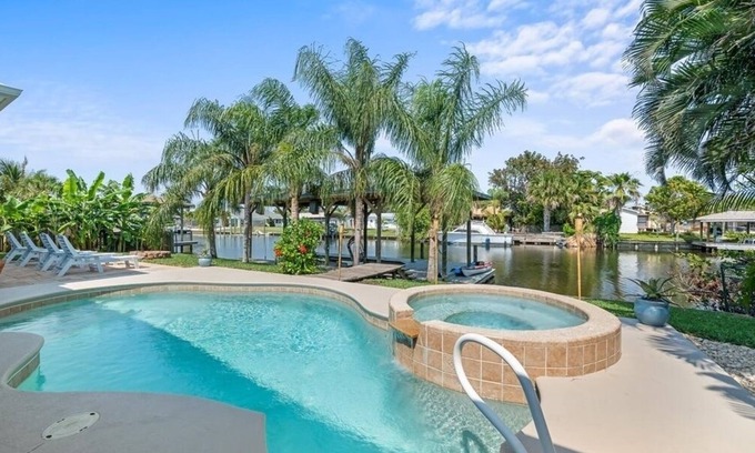 Cocoa Beach House | La Casa de SandPiper on canal with boat dock. Walk to beach!