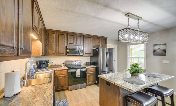 Langston House | Lake Guntersville Vacation Rental w/Fire Pit