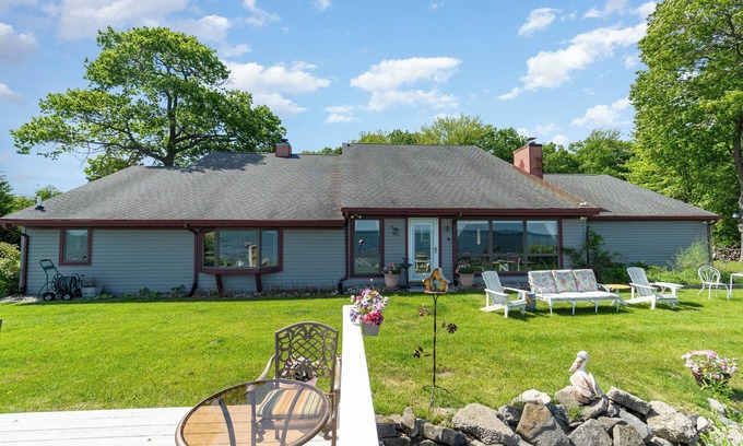 Au Gres House | Lake Huron Beach Retreat has 3 bedrooms and 2 full baths with a sandy beach!