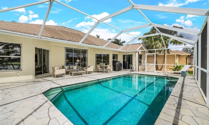 Central Naples House | Lakefront 3-bedroom pool house in Briarwood. Morning sunrise!