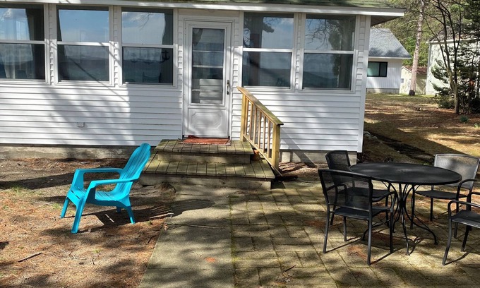 Higgins Lake Cabin | Lakefront Cabin on Higgins Lake. Only steps from the water! boat buoy available