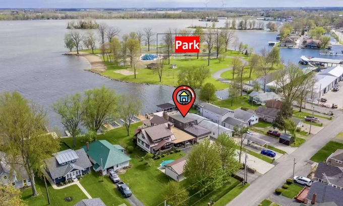 Lakeview House | Lakefront, covered patio, open water views with boat dock.