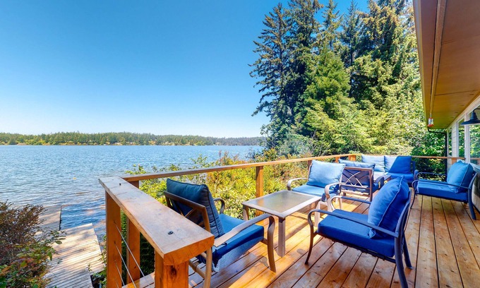 Dunes City House | Lakefront dream with private hot tub, dock, kayaks, pedal boat & amazing views