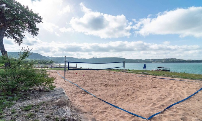 Comanche Trail House | Lakefront Home with Lake Views, Boat Dock, Sand Volleyball and Optional Bar and Game Room